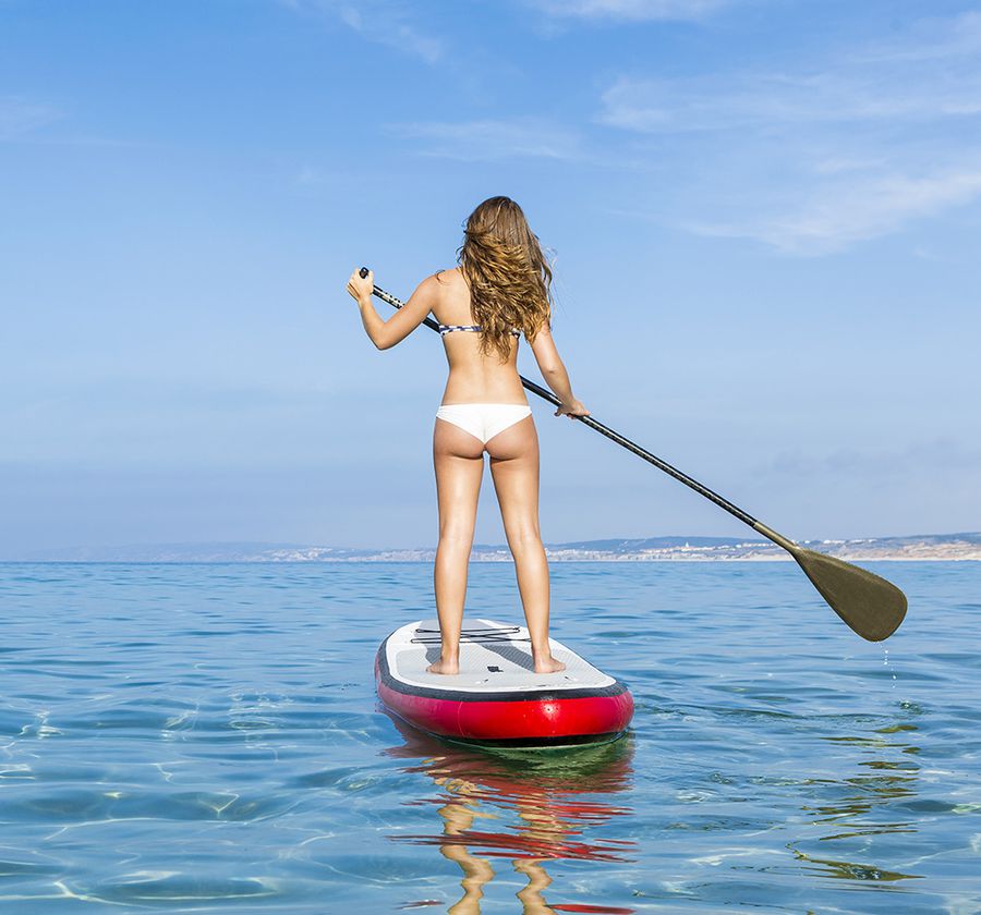 1000-woman-on-stand-up-paddle-board.jpg