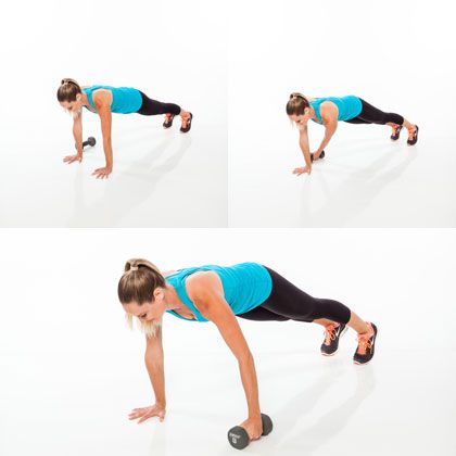 ab workout with weights female: woman demonstrating how to do a plank pull through abs exercise with weights