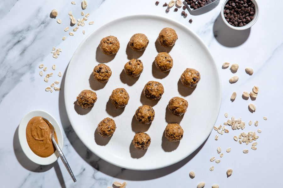 5 ingredient protein balls: a photo of a plate of the chocolate and peanut butter protein balls from this recipe