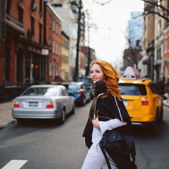 Woman_Crossing_Streets_Of_New_York_City