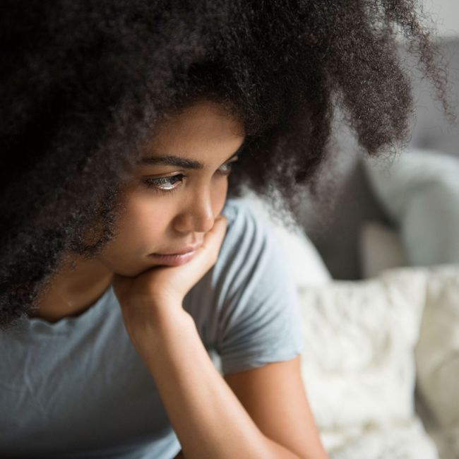 Woman_Holding_Head_In_Hands_Sad