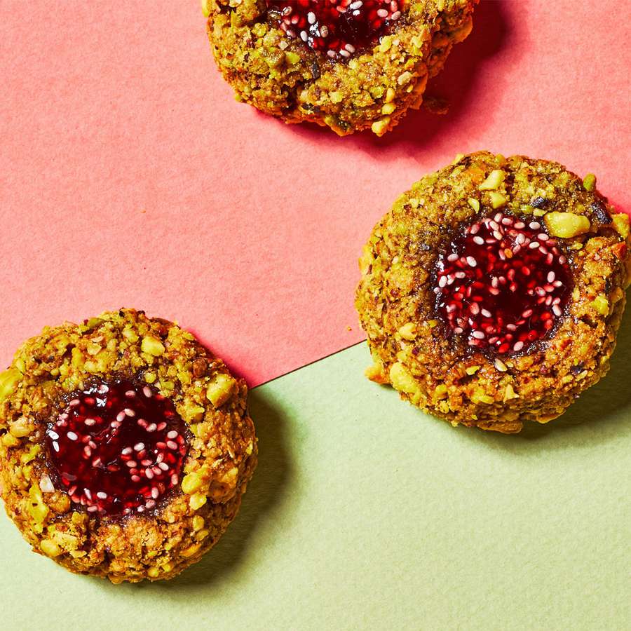 vegan, gluten-free cookies: pistachio butter thumbprints with raspberry-chia filling